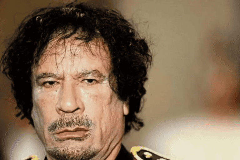 معمر القذافي watanserb.com