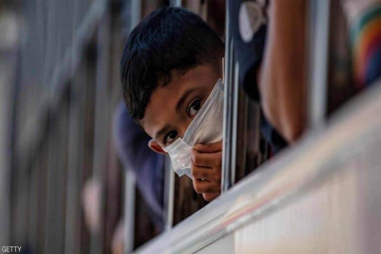 طفل مصاب كورونا في العراق watanserb.com