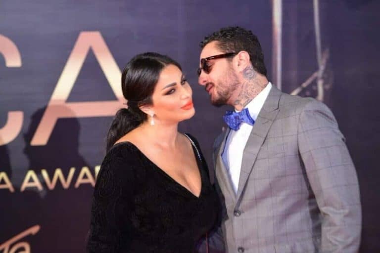 أحمد الفيشاوي يُعيد التصرفات الجريئة مع زوجته أمام الكاميرات! احمد الفيشاوي وزوجته في صور مثيرة watanserb.com