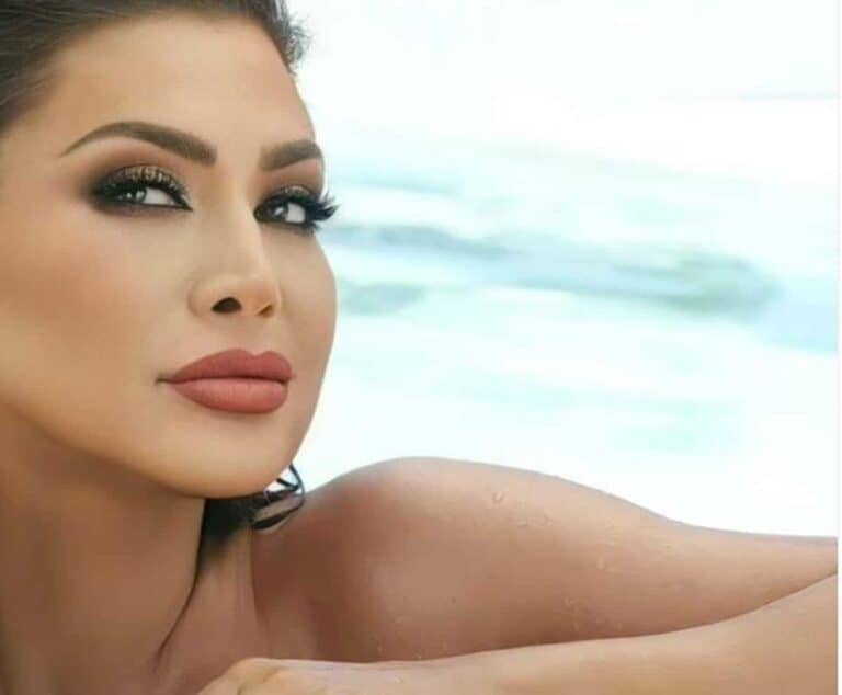 نوال الزغبي بإطلالة جريئة في أغنية "عليه ابتسامة" watanserb.com