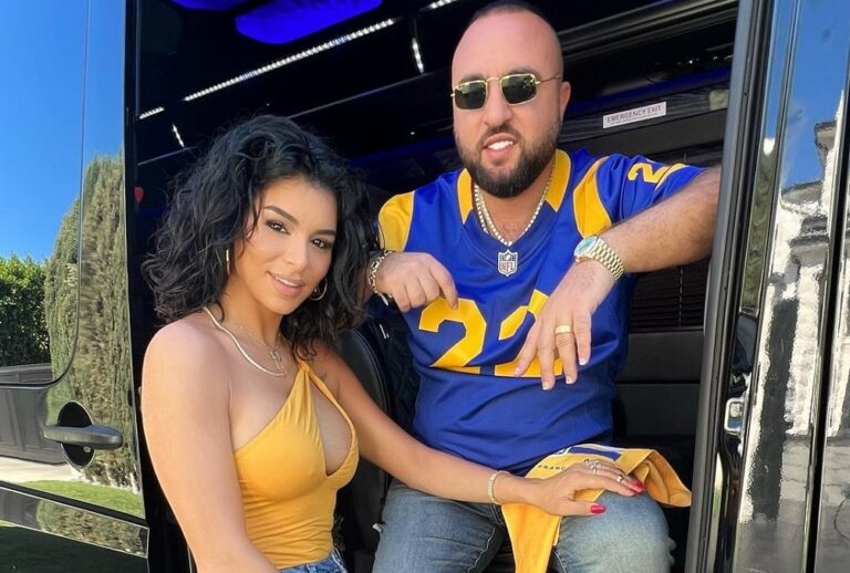 ريما فقيه تغطي صدرها بقطعة قماش وقلادة الصليب فقط وزوجها يصورها watanserb.com