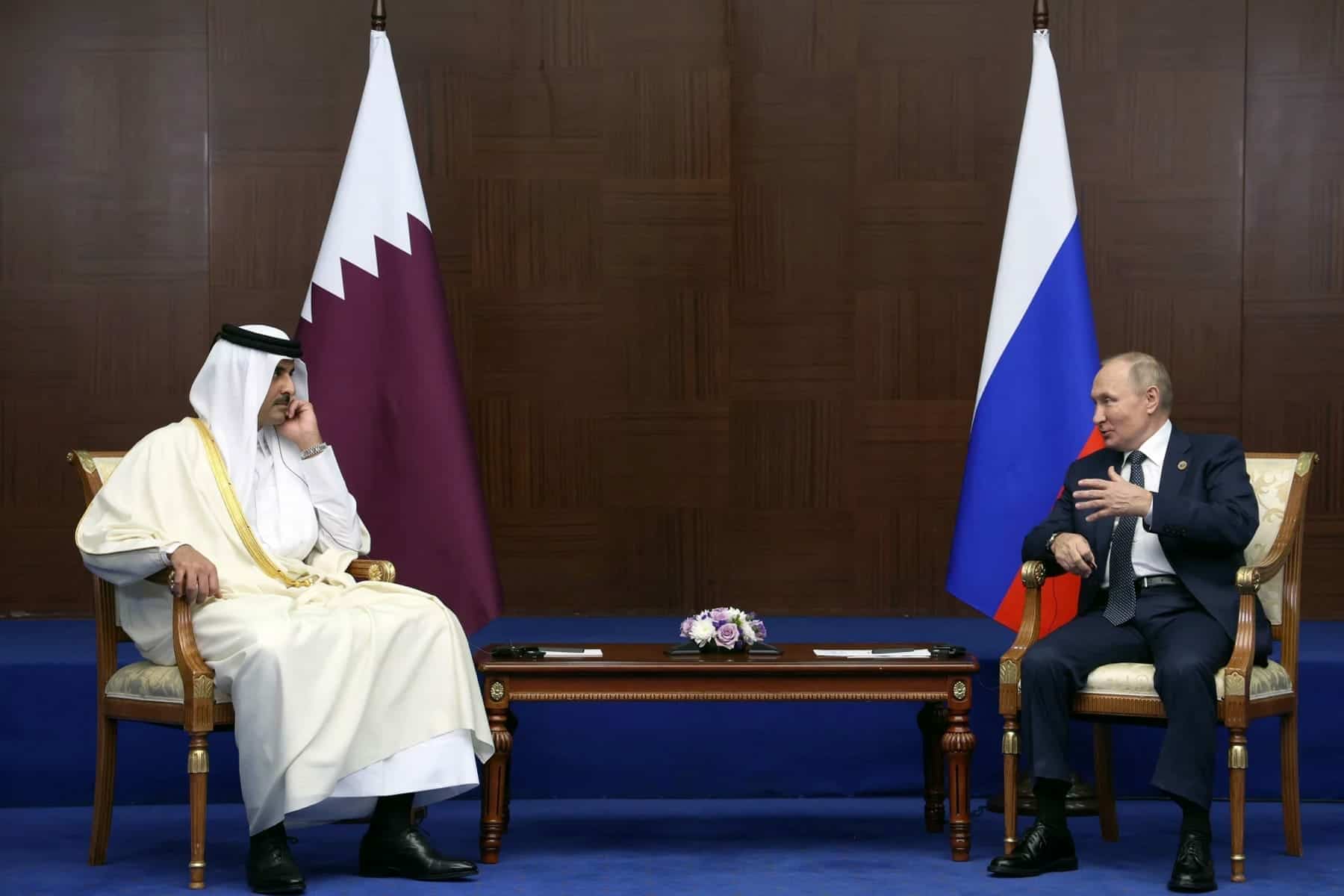 ليس مصادفة.. السبب الحقيقي للقاء أمير قطر وبوتين بعلم أمريكا لقاء أمير قطر وبوتين watanserb.com