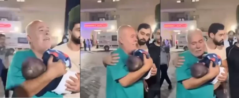 الطبيب الفلسطيني يحمل جثمان حفيده