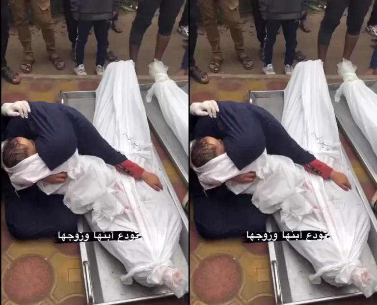 فلسطينية تحمل جثمان طفلها وجثمان زوجها مُمدد بجوارها