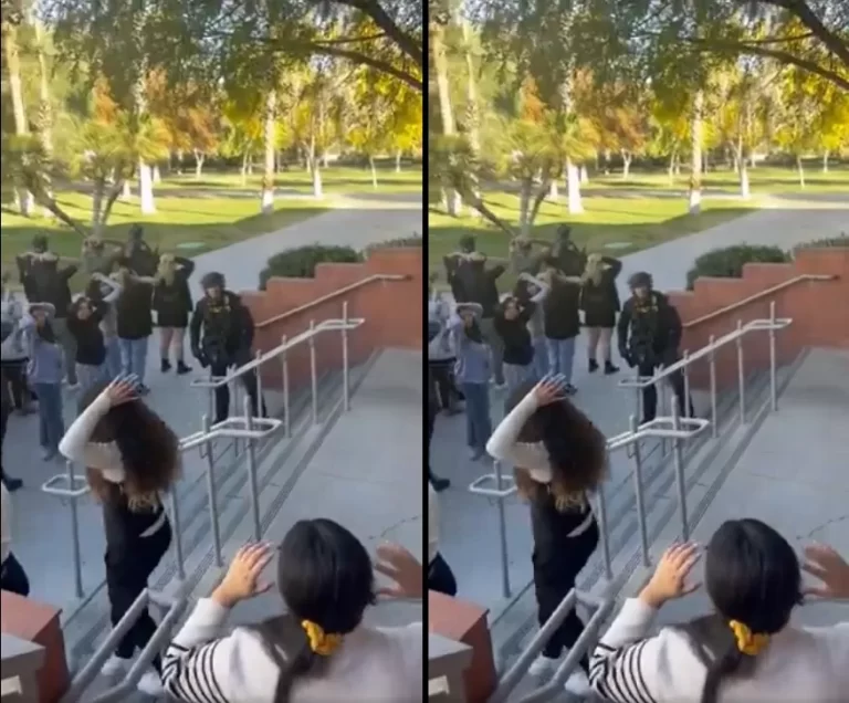 طلبة جامعة نيفادا يرفعون أيديهم أما الشرطة لتفتيشهم بعد مقتل 3 أشخاص